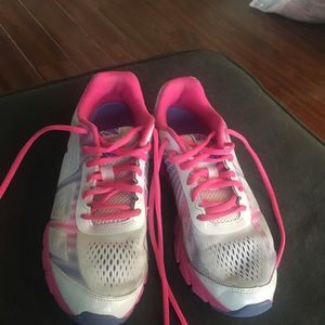 White and pink ASICS